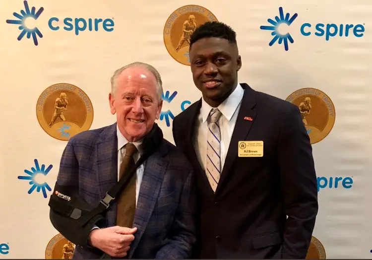 C Spire - Pictured (Left to Right): Perian Conerly - Wife of the late  Charlie Conerly, Hu Meena - CEO of C Spire, and A.J. Brown - 2017 C Spire  Conerly Trophy Recipient